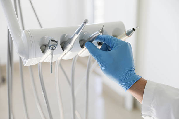 Professional Tooth Extraction technician working in Ness City, KS